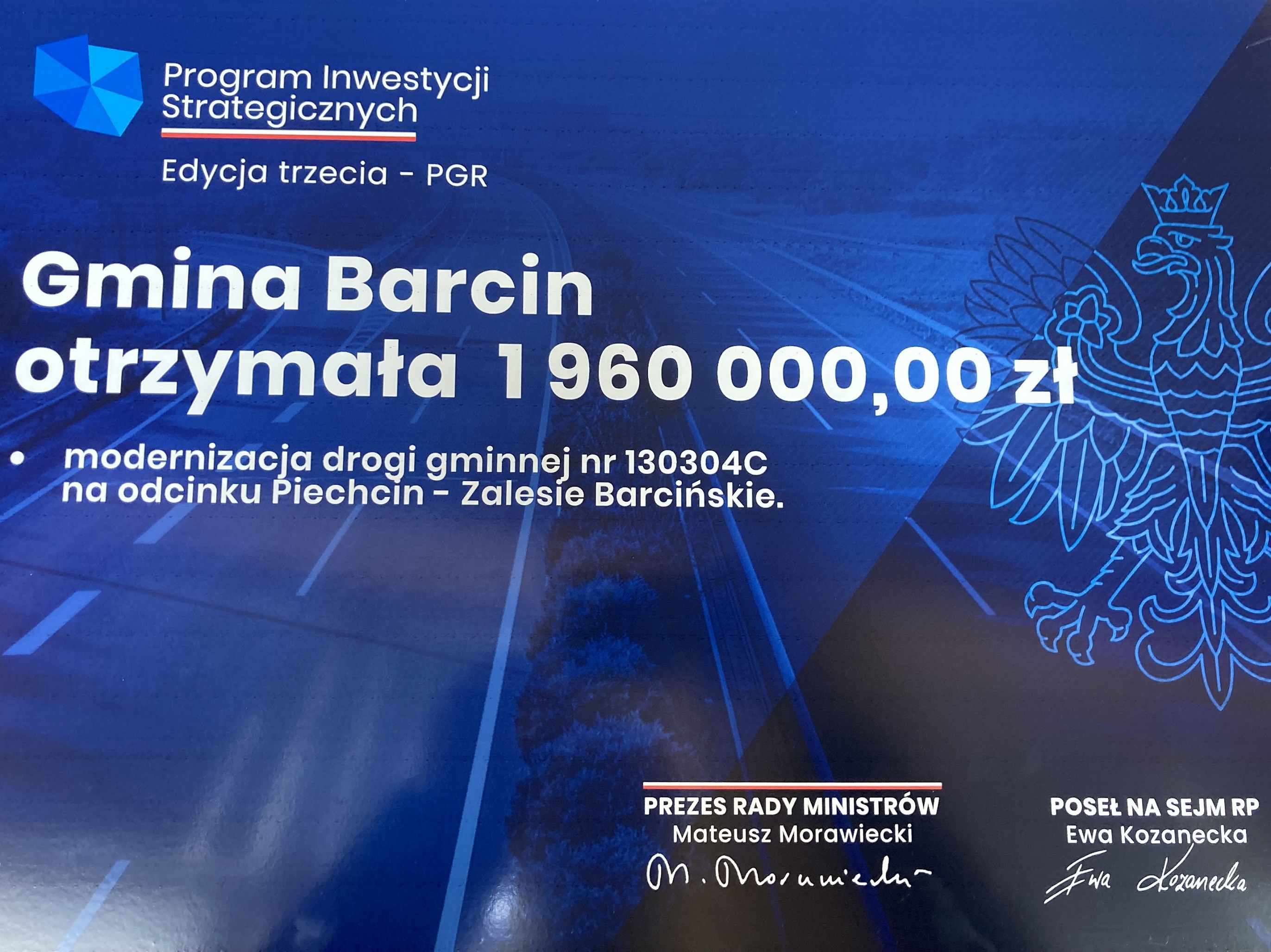 Symboliczna promesa dofinansowania modernizacji drogi gminnej nr 130304C na odcinku Piechcin – Zalesie Barcińskie z Rządowego Funduszu Polski Ład: Program Inwestycji Strategicznych (Edycja trzecia – PGR)
